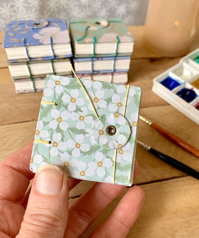 Coptic Bound Tiny Floral Watercolour Sketchbook. Pale Green, white and yellow.