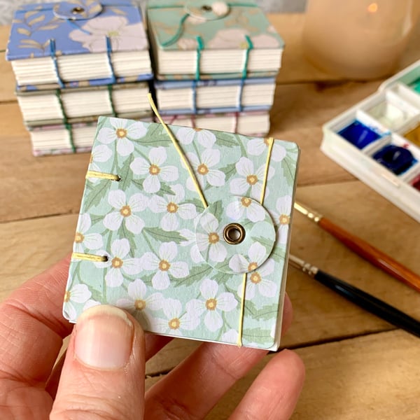 Coptic Bound Tiny Floral Watercolour Sketchbook. Pale Green, white and yellow.