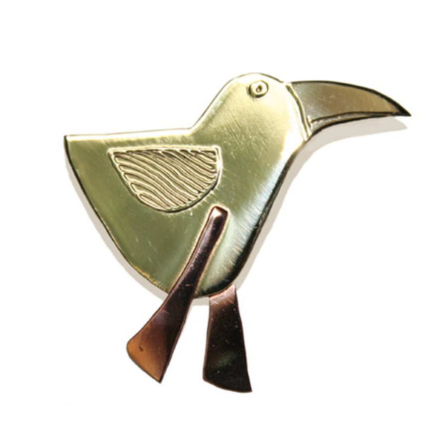 bird brooch with long pink legs