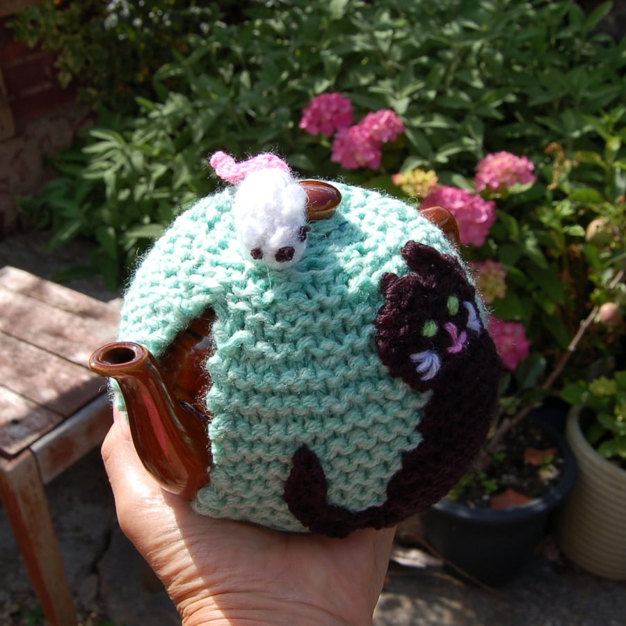 Cat and Mouse tea cosy - hand knitted - to fit a small  teapot  