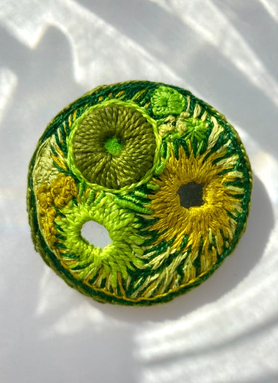 Green tangerine, hand embroidered brooch in zesty greens.