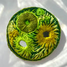 Green tangerine, hand embroidered brooch in zesty greens.