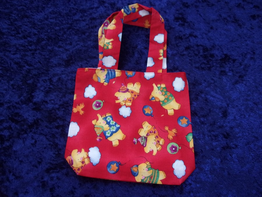 Playful Elephants on a Red Background Childs Fabric Handbag