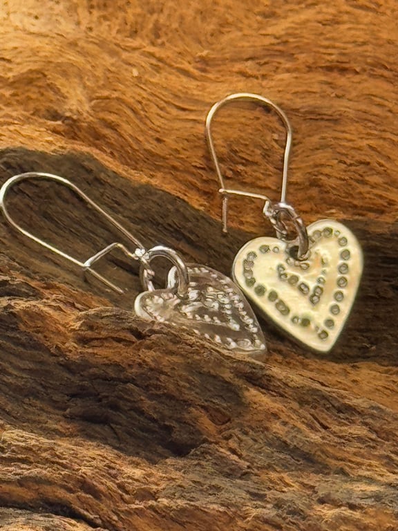 Silver heart dangling drop earrings 