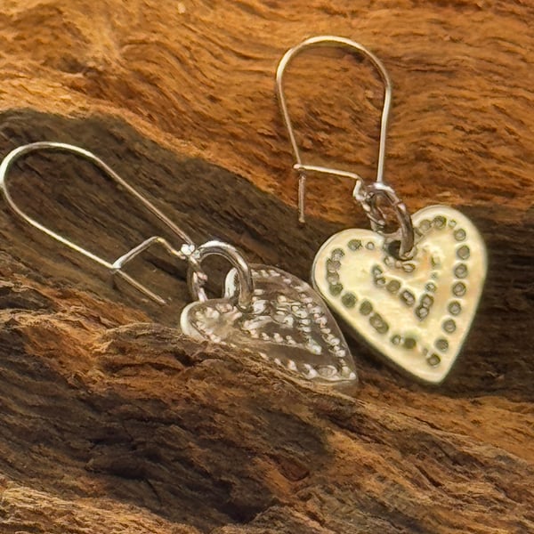 Silver heart dangling drop earrings 