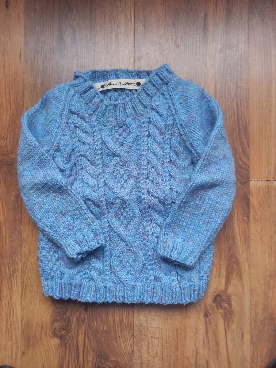 Hand knitted childs cable stitch Aran jumper