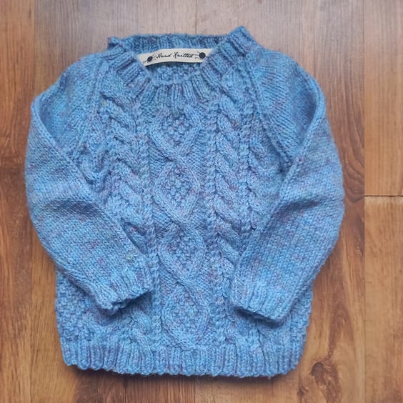 Hand knitted childs cable stitch Aran jumper
