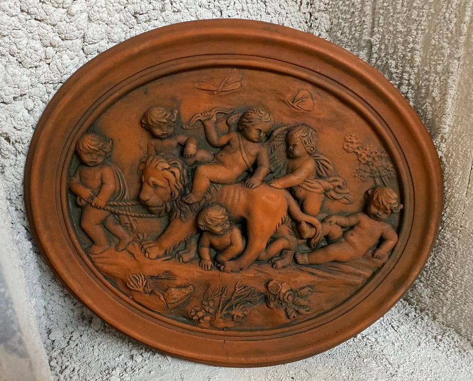 Cupid and Lion Oval Plaque