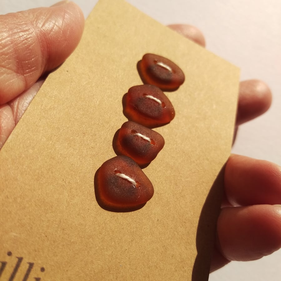 Set of four brown sea glass buttons