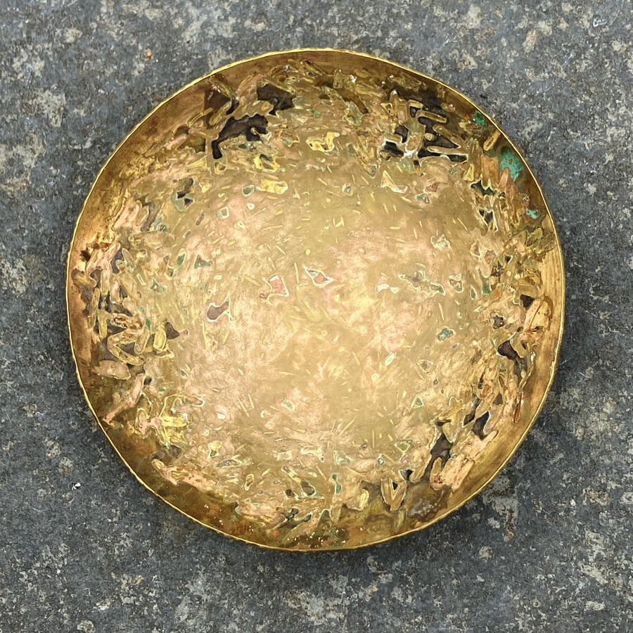 Hand raised brass bowl with colourful patina
