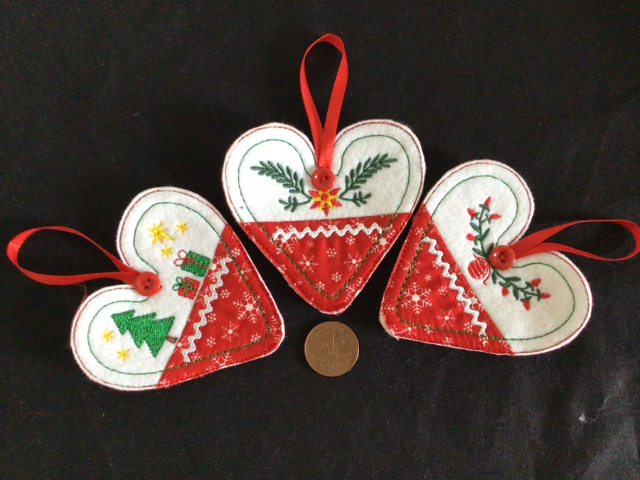 Set of three Christmas heart decorations.