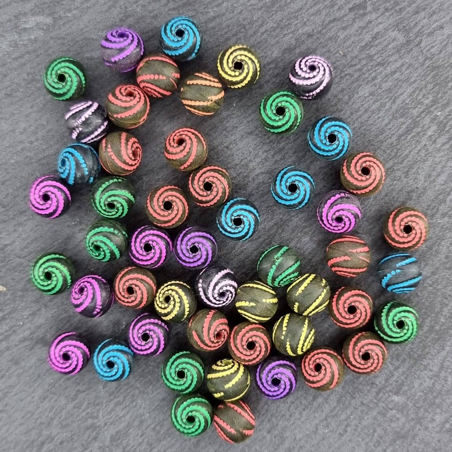 50 multi coloured black round beads