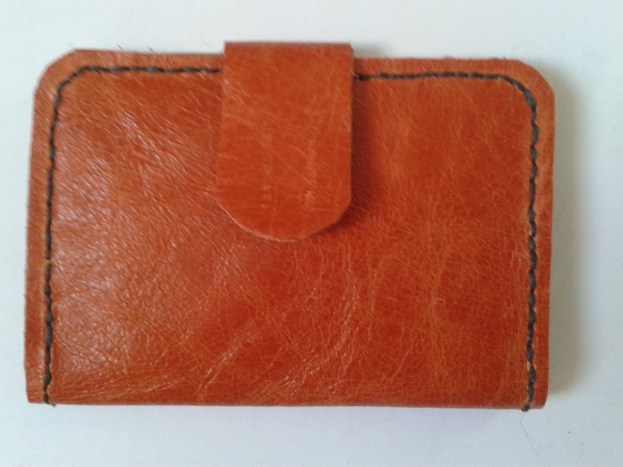 orange and brown  leather card wallet