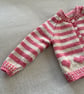 Baby’s pink and cream striped cardigan with heart motifs - Image 3
