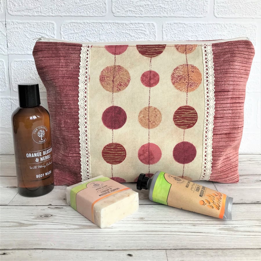 Dusky pink toiletry bag, wash bag with panel featuring circles print pattern