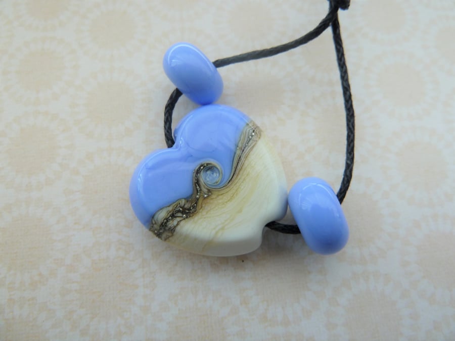 handmade lampwork glass blue heart bead