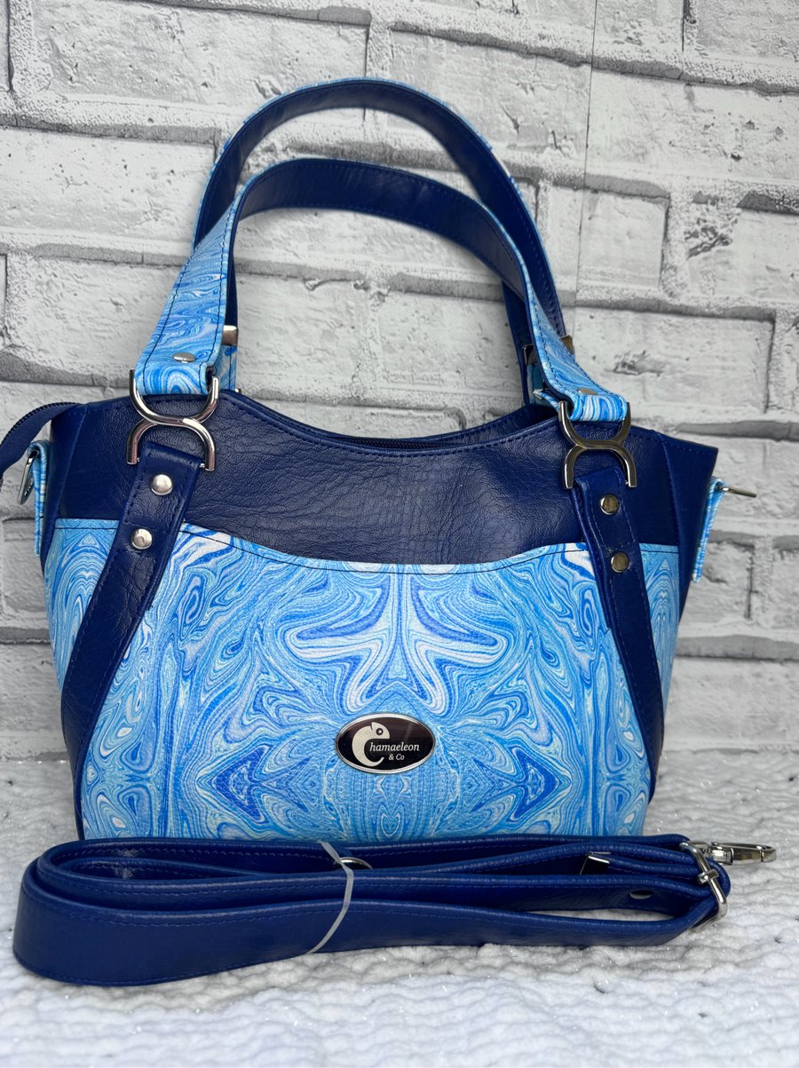 Handbag in blue faux leather with crossbody strap