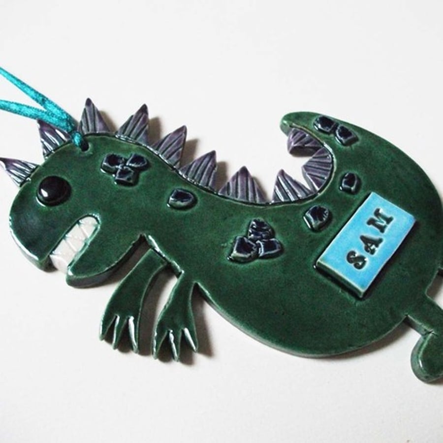 Ceramic personalised dinosaur wall hanging decoration