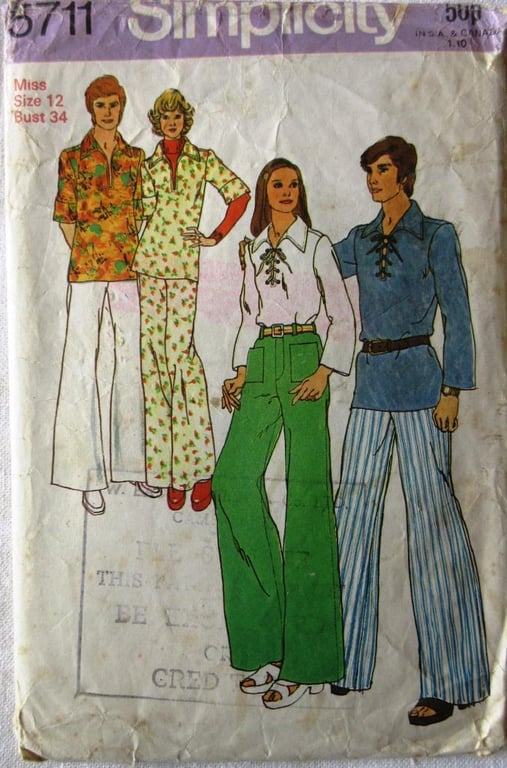 A vintage sewing pattern for a misses' pullover shirt and wide leg trousers
