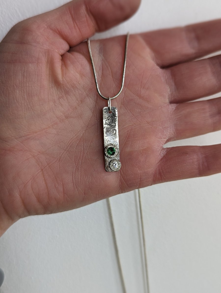 Textured Silver Pendant with Green and Clear Glass Stones