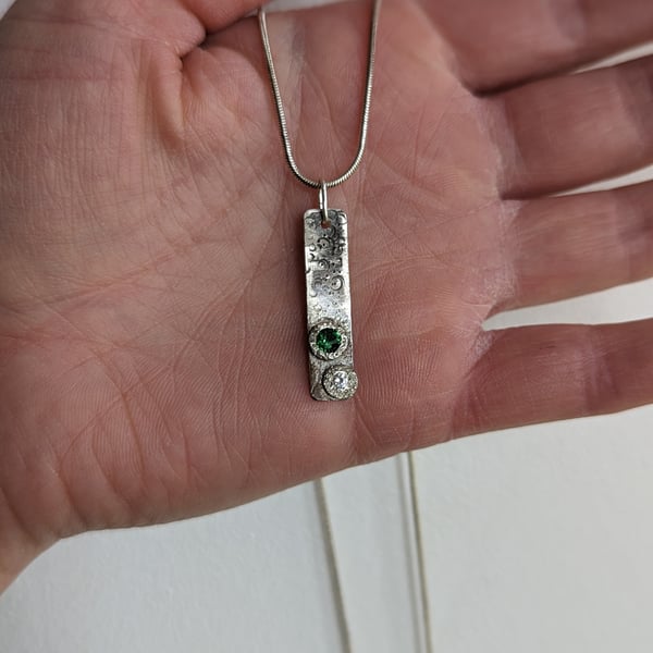 Textured Silver Pendant with Green and Clear Glass Stones
