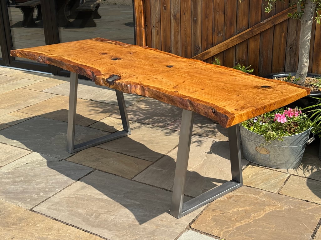 Handmade English Oak live edge dining table with brushed steel legs