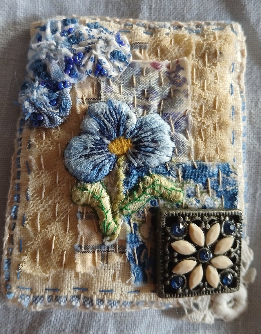 Slow-stitched and needle-painted blue floral brooch