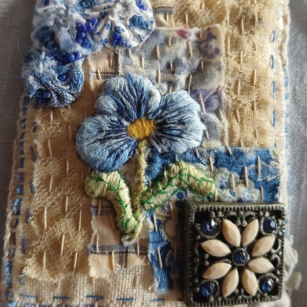 Slow-stitched and needle-painted blue floral brooch