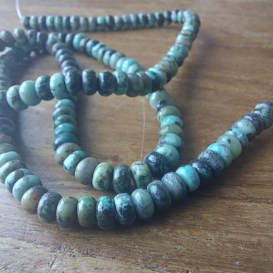 4 x 2mm African Turquoise Rondelles. 16" Strand.