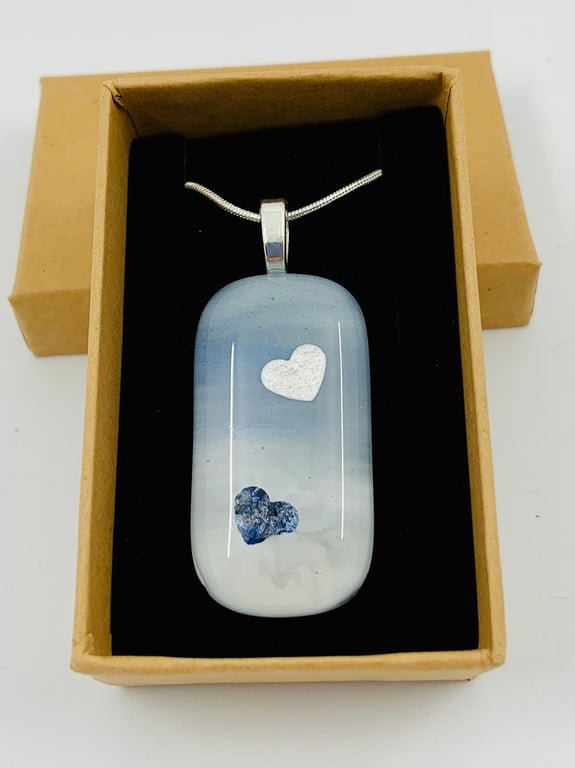 Hand made Fused Glass and enamel painted pendant with heart inclusions.