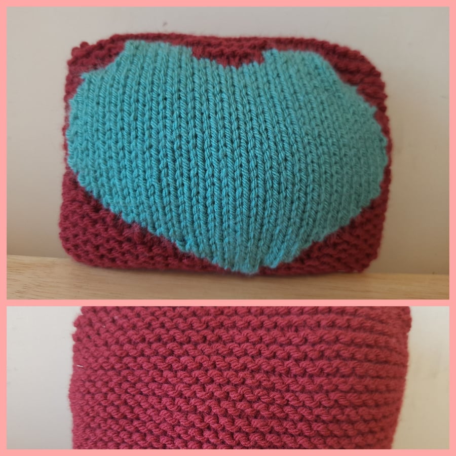 Small heart pattern knitted cushion