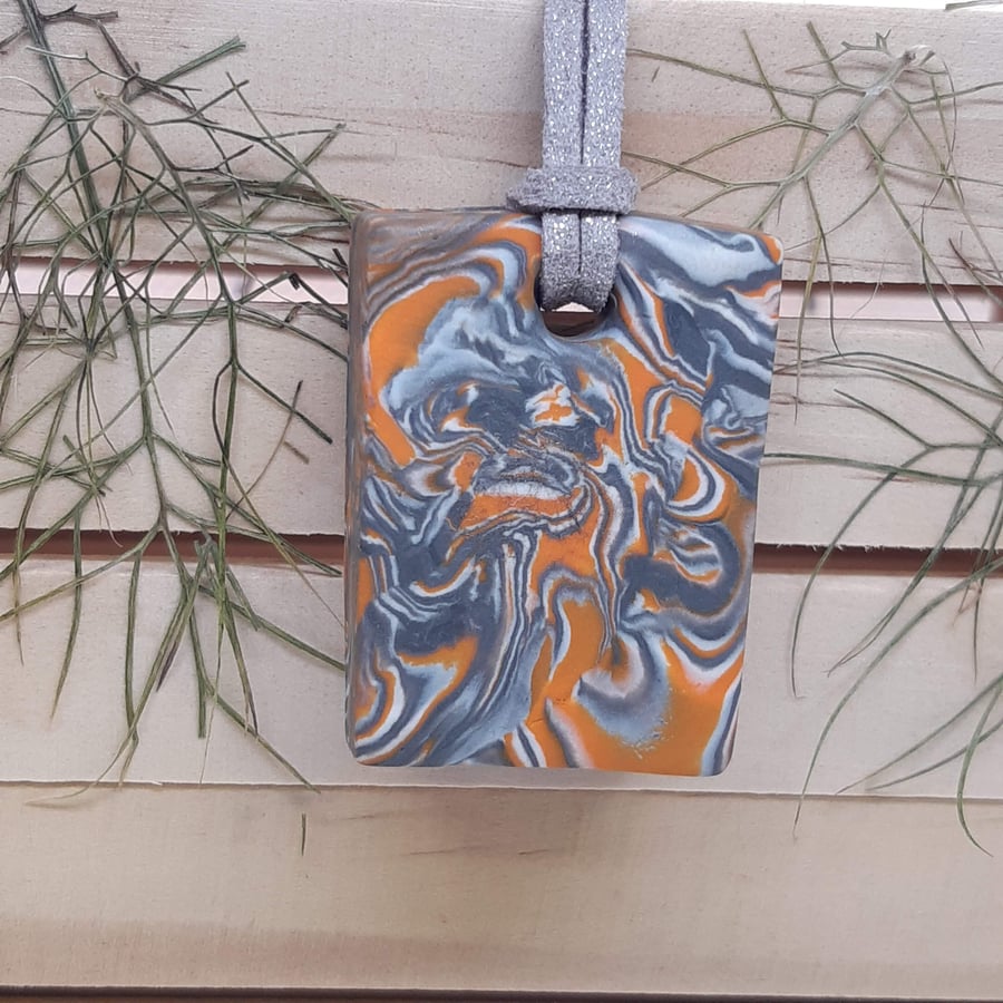 Orange and silver rectangular pendant