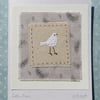 Little Dove hand-stitched card with pretty feather print fabric background