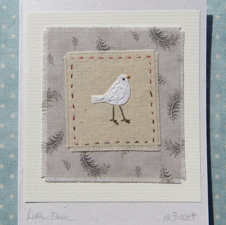 Little Dove hand-stitched card with pretty feather print fabric background
