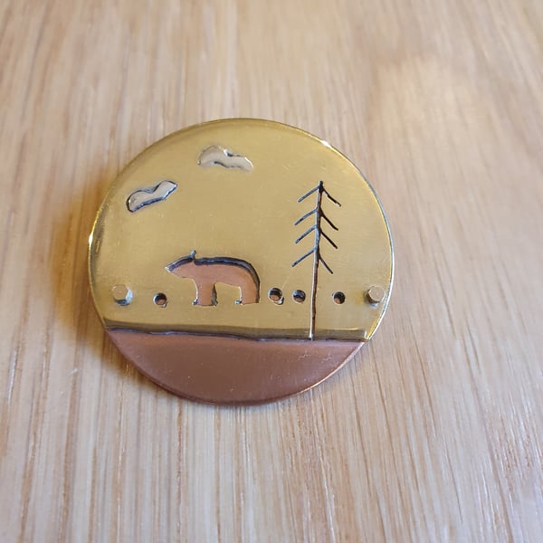 Brass and coper bear in the woods pendant