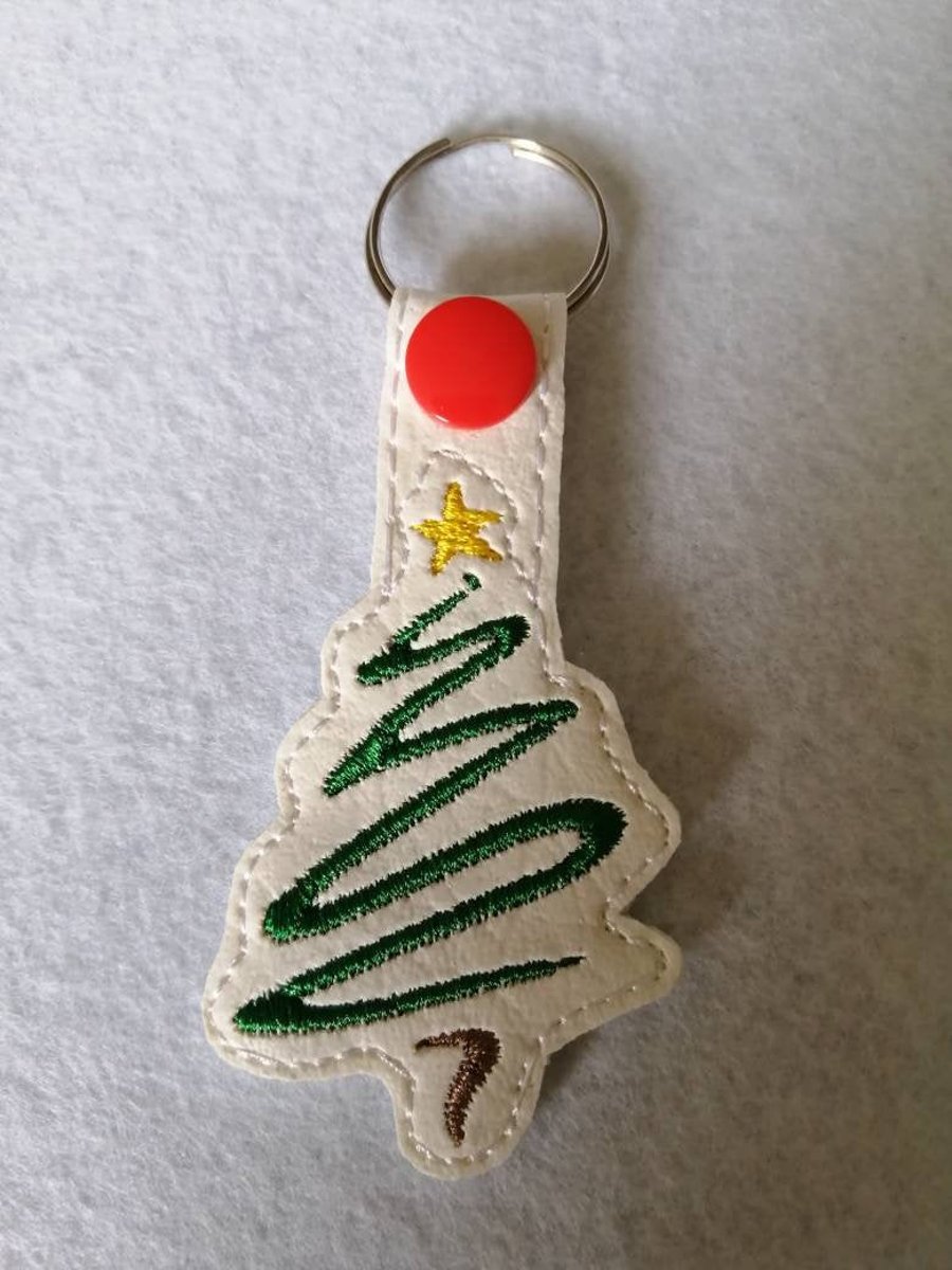 711. Christmas tree keyring.