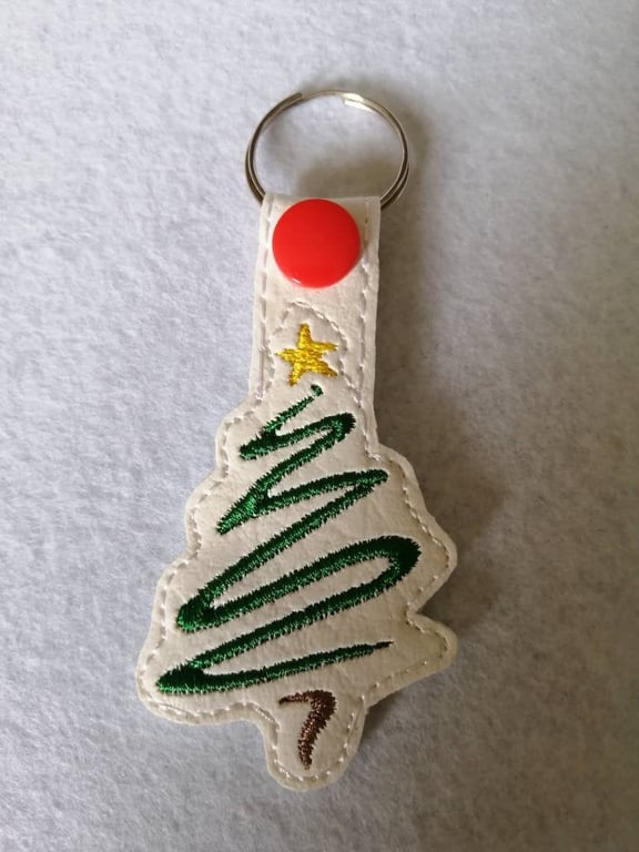 711. Christmas tree keyring.