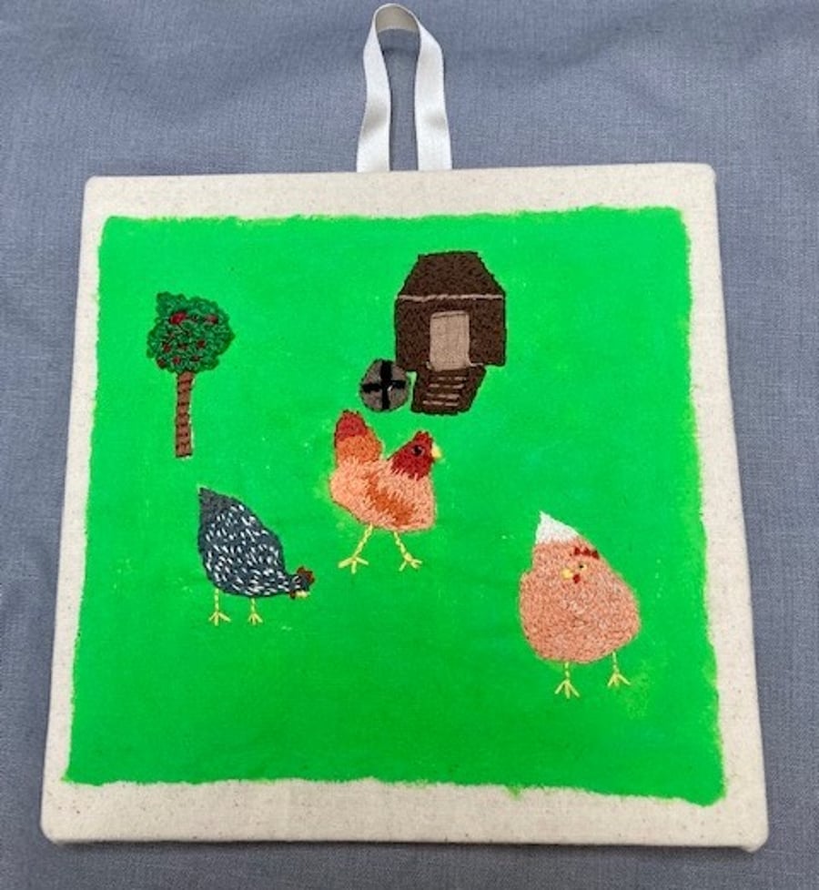 Three chicken embroidered picture.