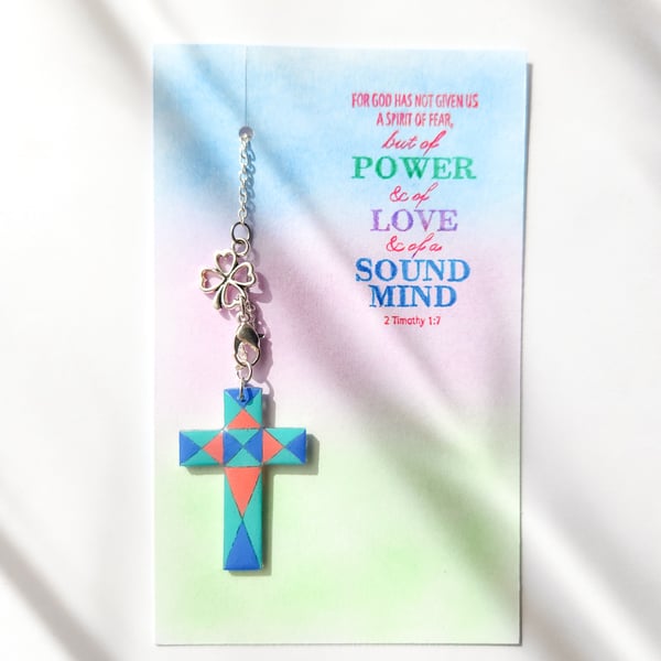 A cross hanging or bookmark