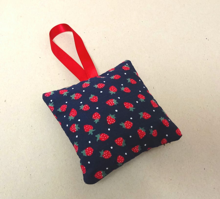 Lavender bag in navy with red strawberries, single hanging lavender sachet.