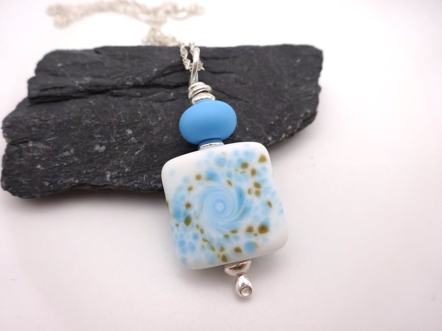 blue and brown lampwork glass pendant necklace