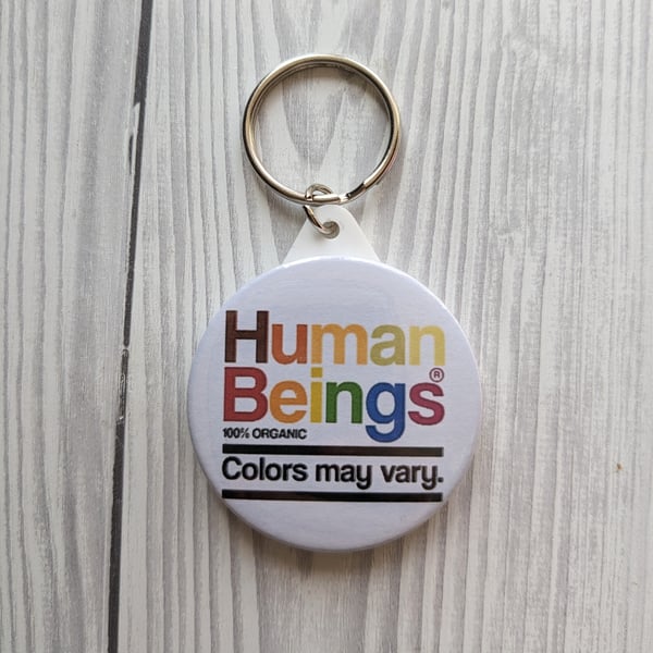 Progress Pride - "Human Beings 100% Organic Colors May Vary" Keyring 