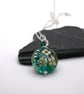 lampwork glass teal green flower pendant necklace