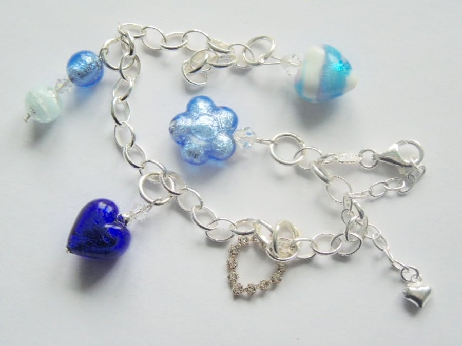 Murano glass and sterling silver blue charm bracelet with Swarovski.