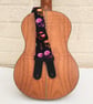 1 inch Wide Adjustable Ukulele Strap with Rainbow Skulls - Image 1