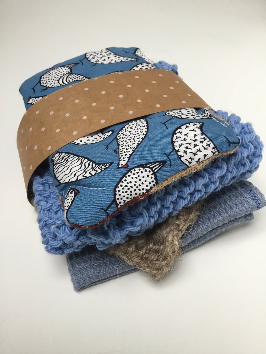 Compostable, eco-friendly and plastic-free cleaning set. Blues with chickens.