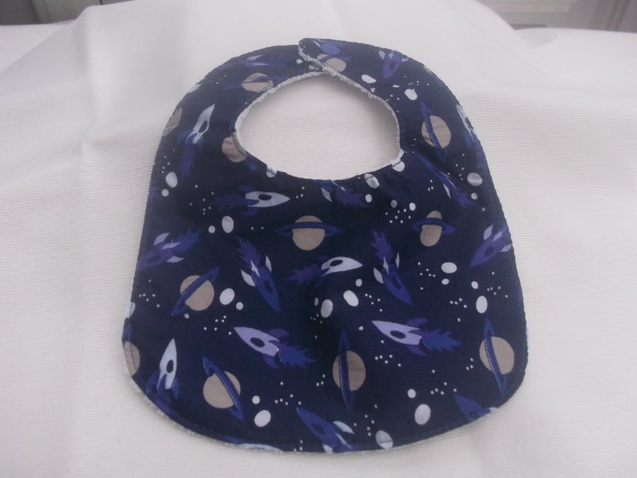 Boys bib with space rockets and planets