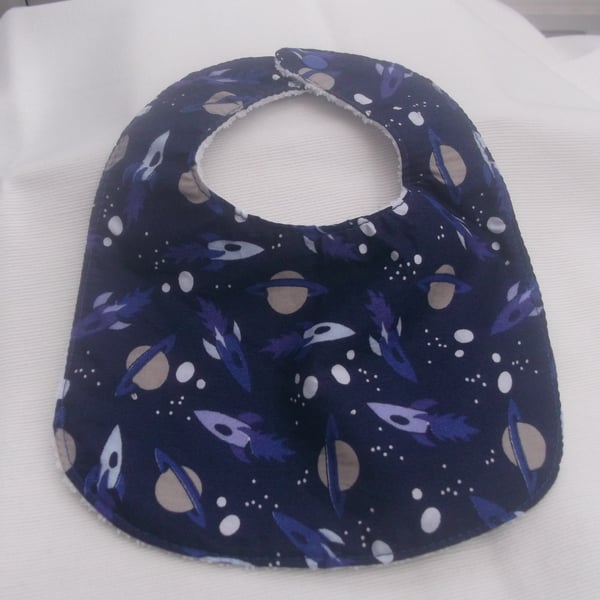 Boys bib with space rockets and planets