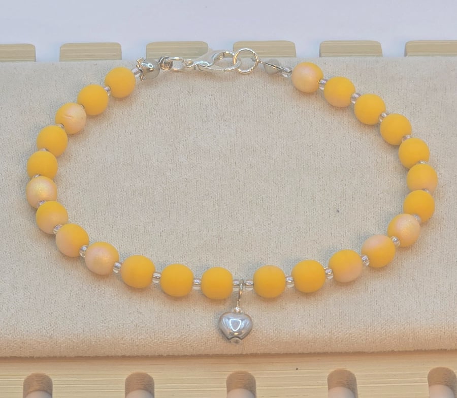 Yellow Czech glass bracelet with silver heart charm