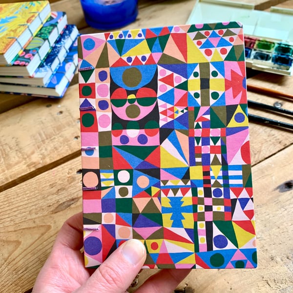 Hand Bound A6 Watercolour Sketchbook with Coptic Stitch Exposed Spine.